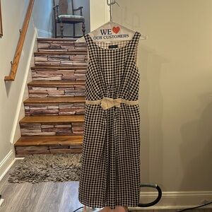 Very Jackie O, spectacular head turner. Silk dress